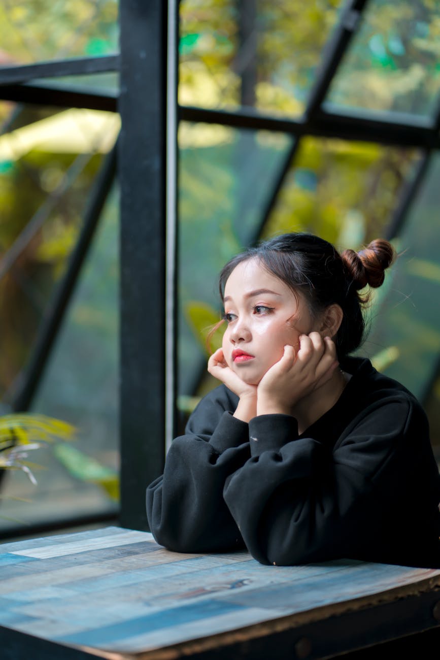 upset you asian female millennial resting in cafe