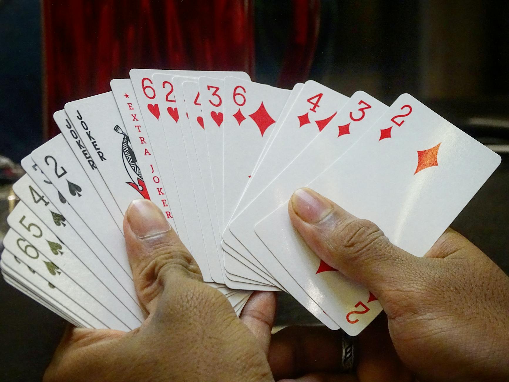 pexels-photo-800767 gaming cards on hands